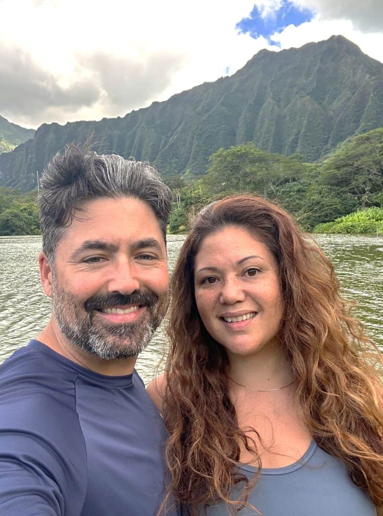 Chad Hilweh and Liana Hilweh of Hawaii Deck Builders, a division of Hilweh Builders with the Koolau mountains of Oahu in the background.
