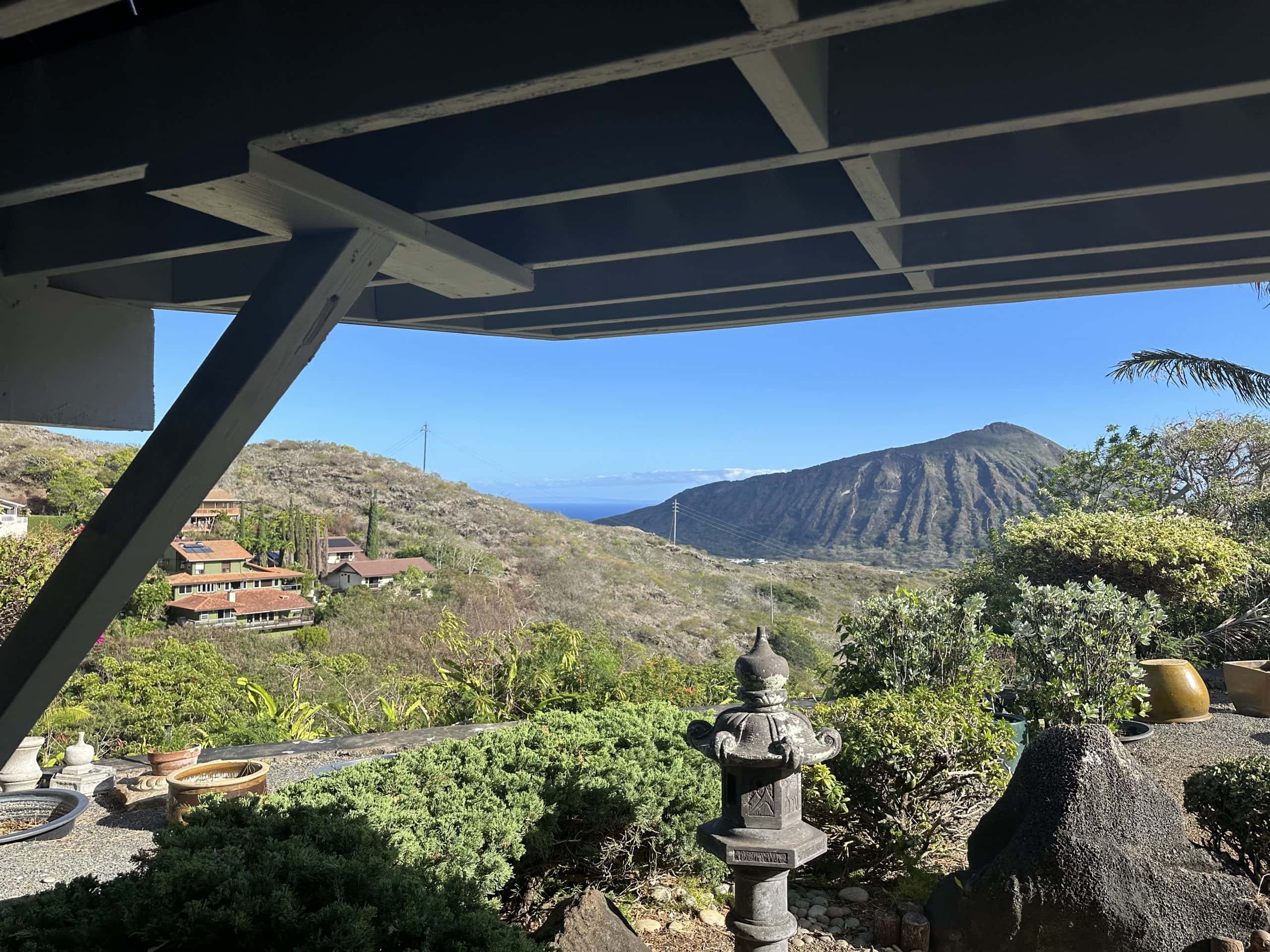 Lower level of deck showing deck substructure such as joists with a scenic photo of Koko Crater in Oahu in the background.